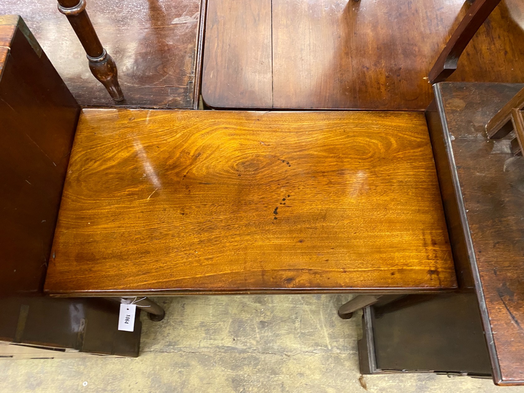 An 18th century mahogany rectangular folding tea table, width 73cm, depth 38cm, height 71cm